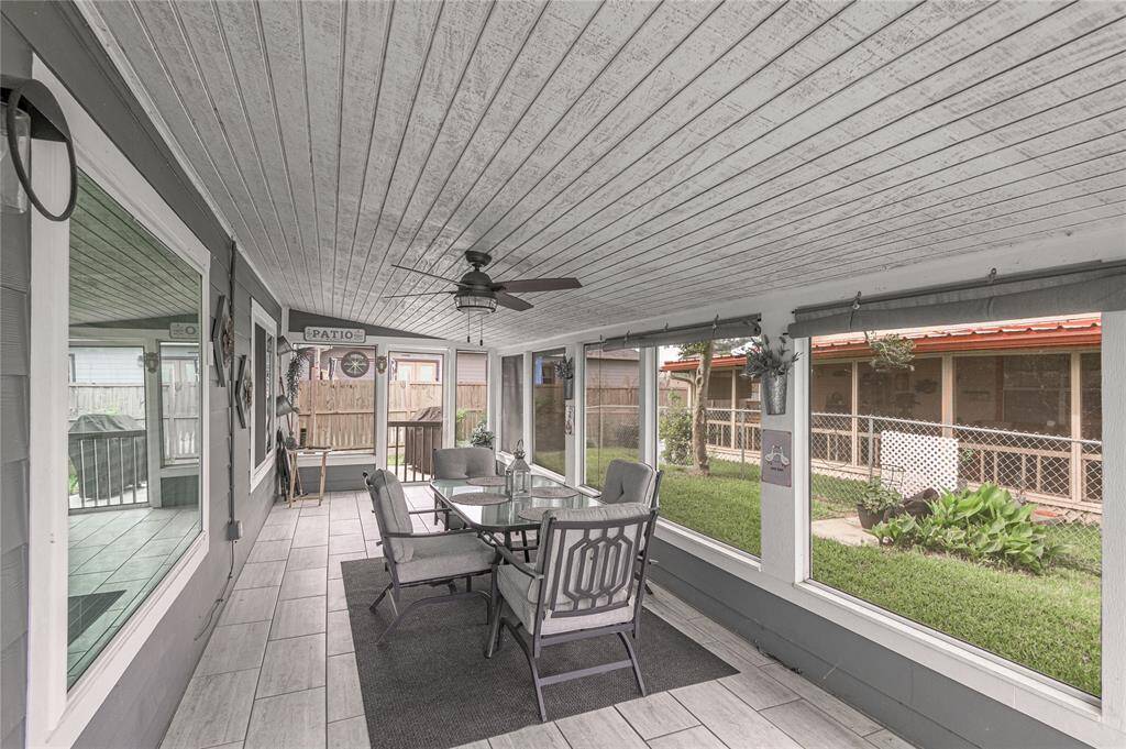 Enter through the enclosed porch