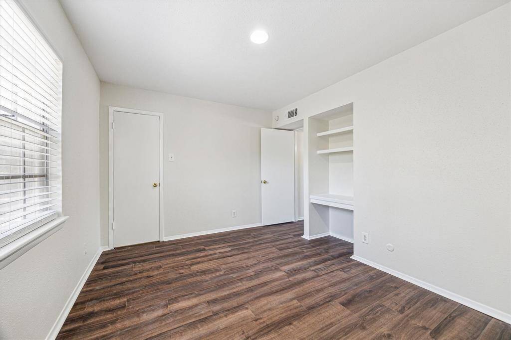2nd bedroom with built in desk.