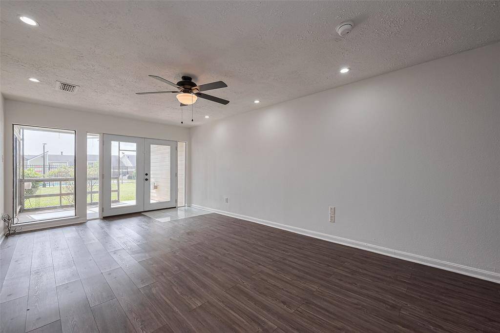 Living room with french doors going out to patio