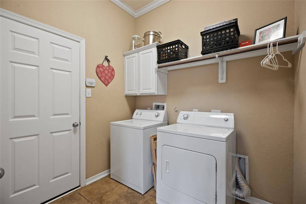 Inside the home laundry room and extra storage