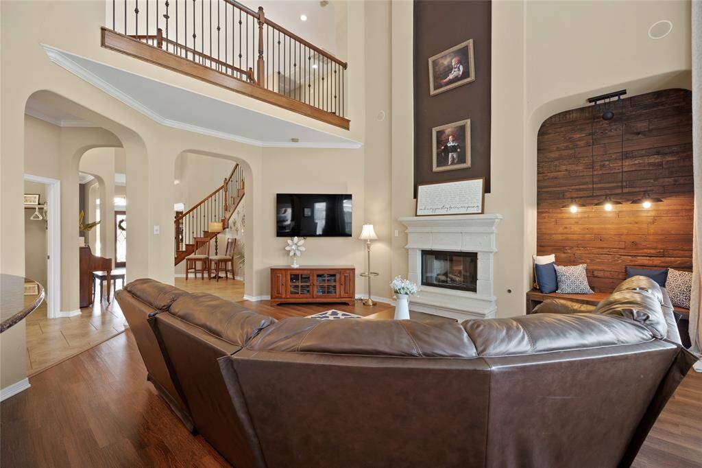 Large living room with view of catwalk upstairs