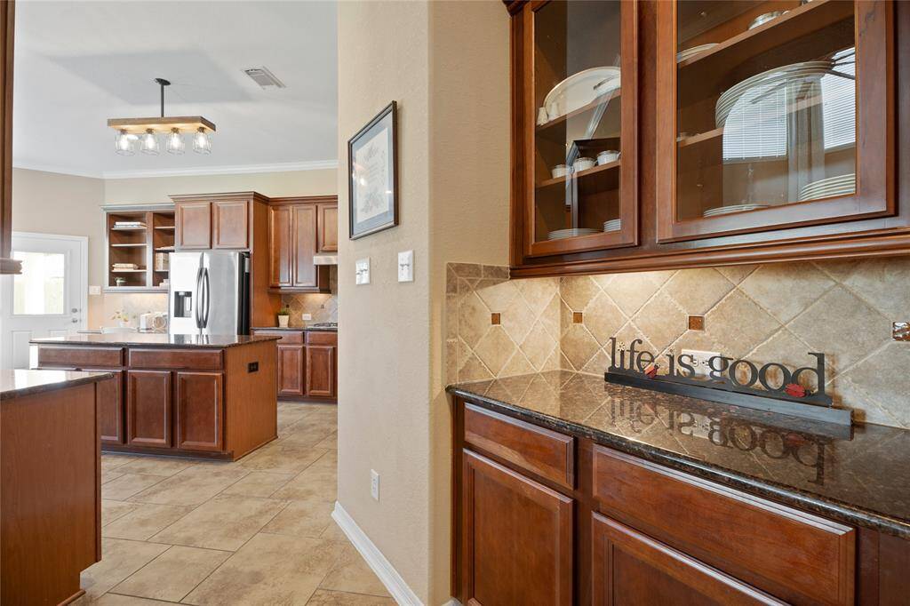 Butlers Pantry with glass cabinets