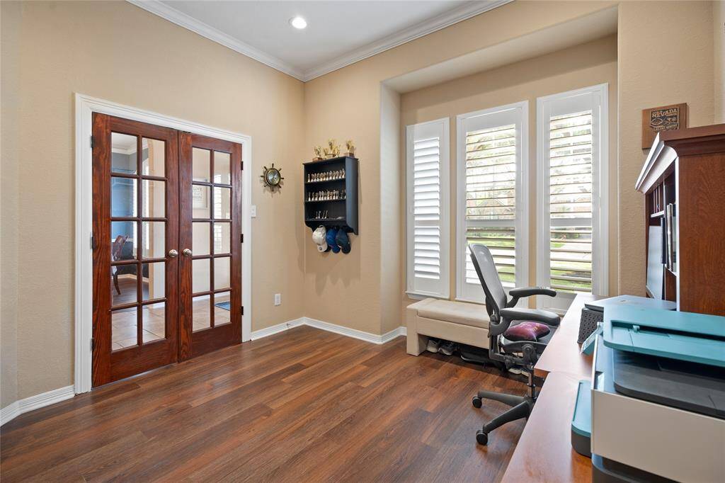 Home office/ study with custom French doors and plantation shutters