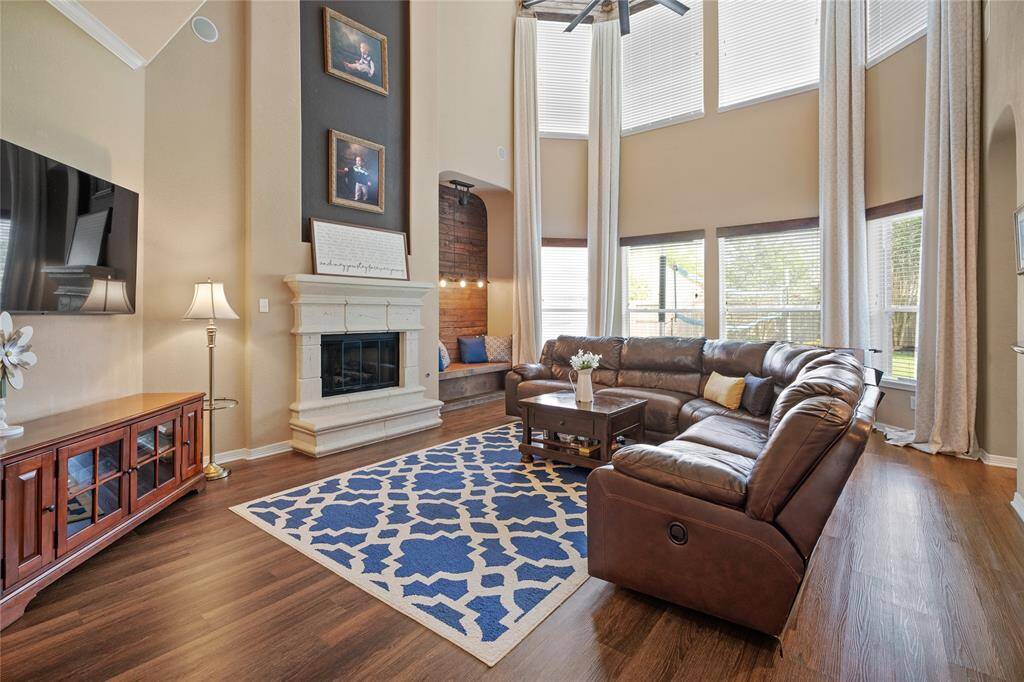 High vaulted ceilings with window treatment