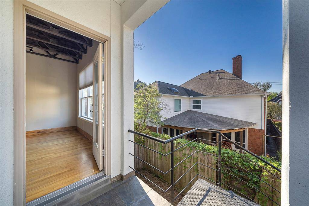 Small balcony off the 2nd Level Denwith Spiral staircase that leads down tothe fenced backyard