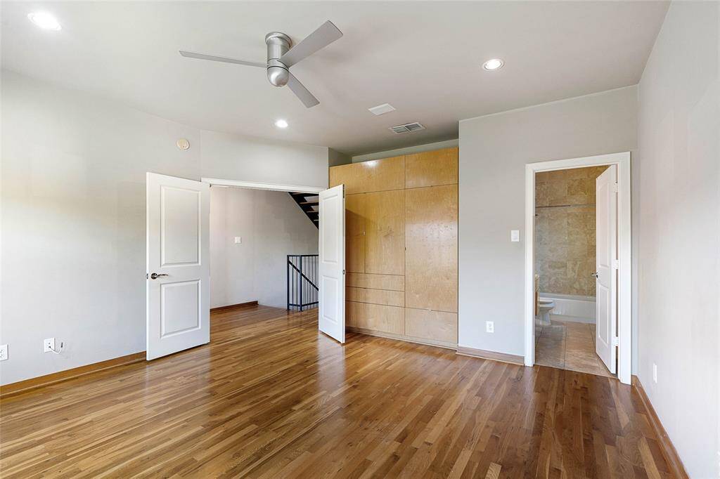 Secondary Bedroom on the 3rd Level(approx. 14x14) w/Wood floors, CustomBuilt-in Maple Closet Storage, recessedlighting, modern ceiling fan, en-suite fullbath.