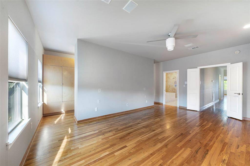 Another view of primary bedroom suite.