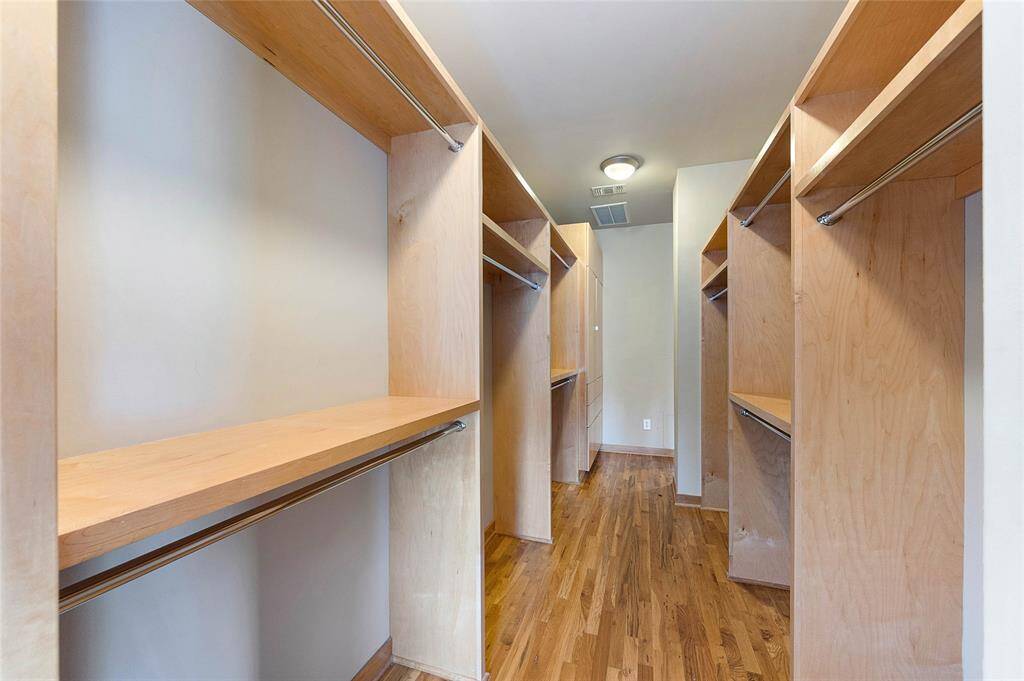 Walk-in closet of primary suite
