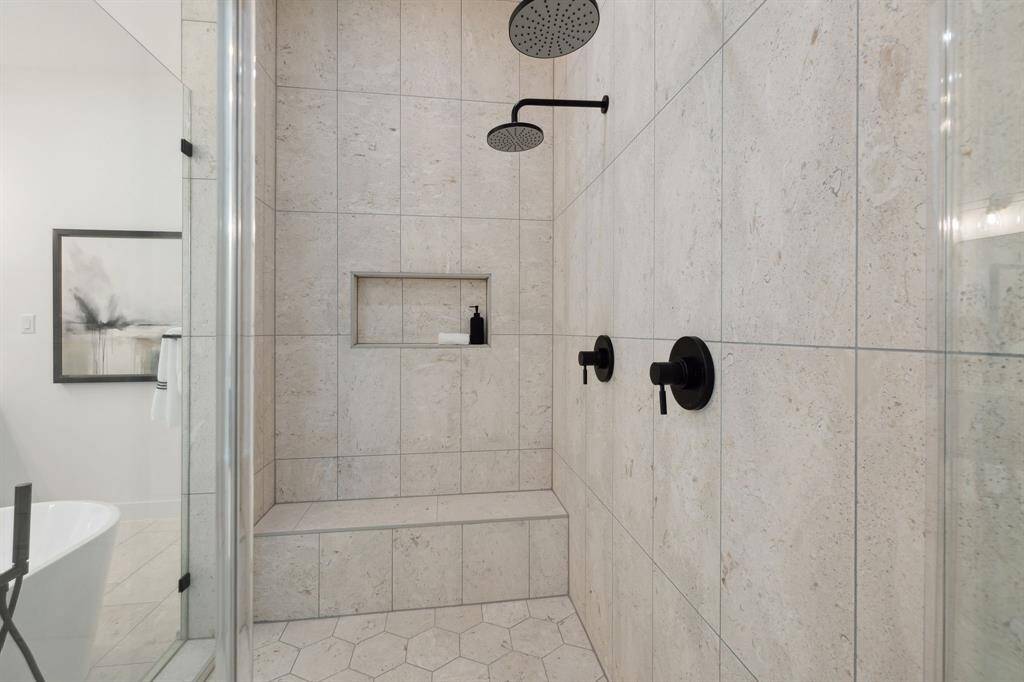 Oversized frameless shower.