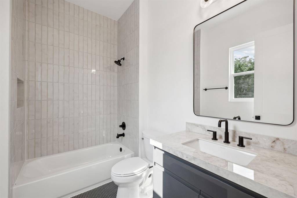 Ensuite bathroom with stylish finishes.
