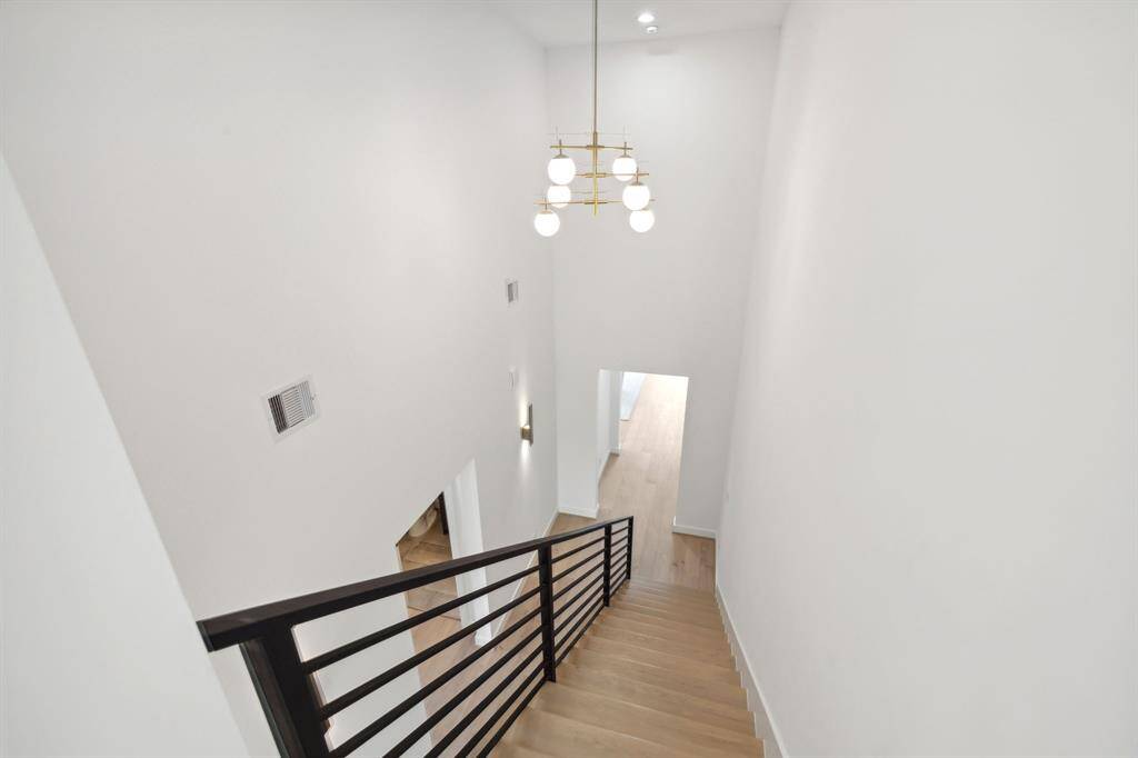Impressive ceiling height and finishes along the third floor hallway between the bedroom and the gameroom.