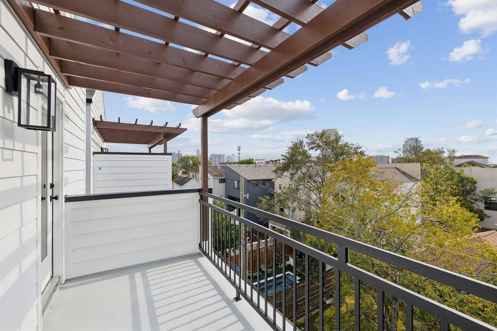 Fourth floor terrace complete with downtown views.