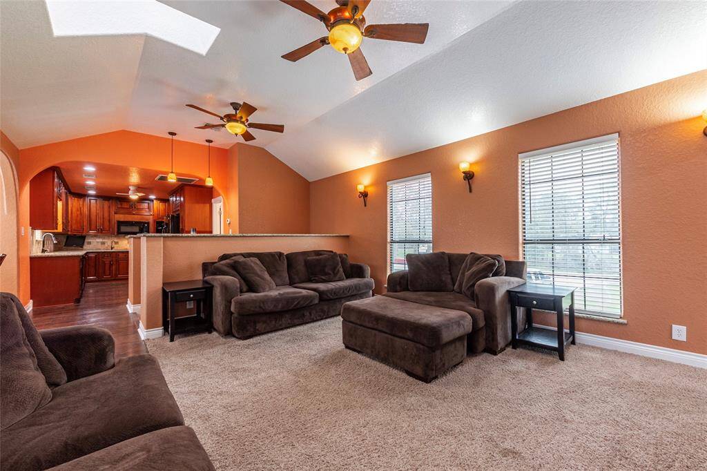 Family room open to the kitchen and dinning