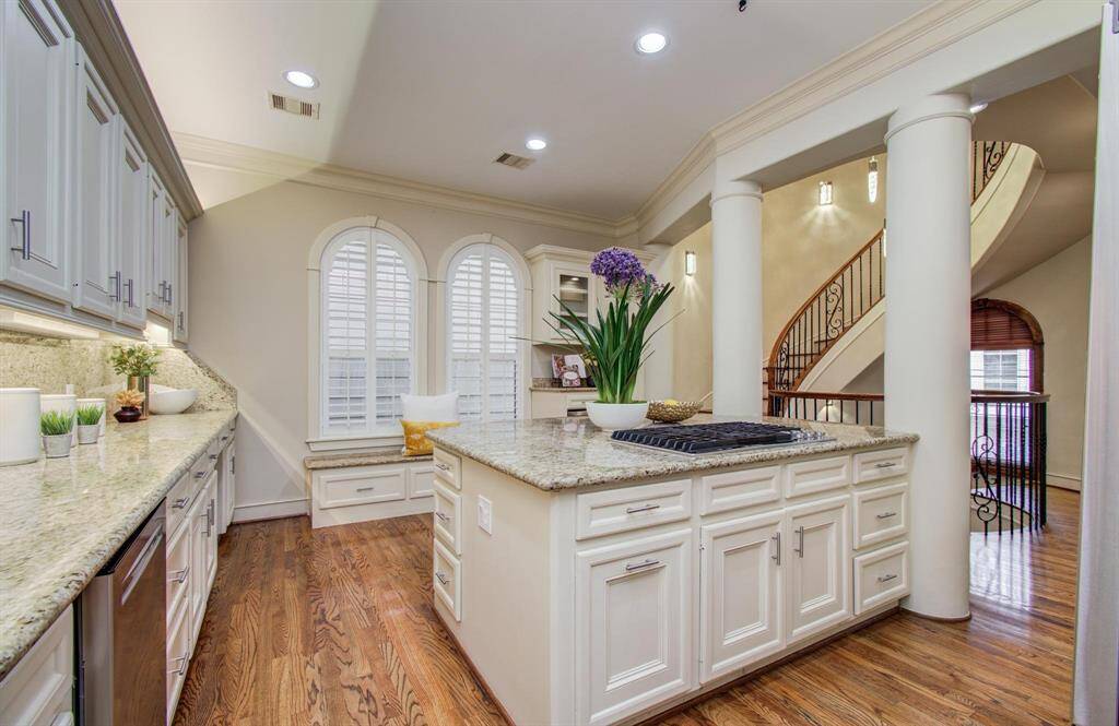 The kitchen has great flow for entertaining with a sizable island