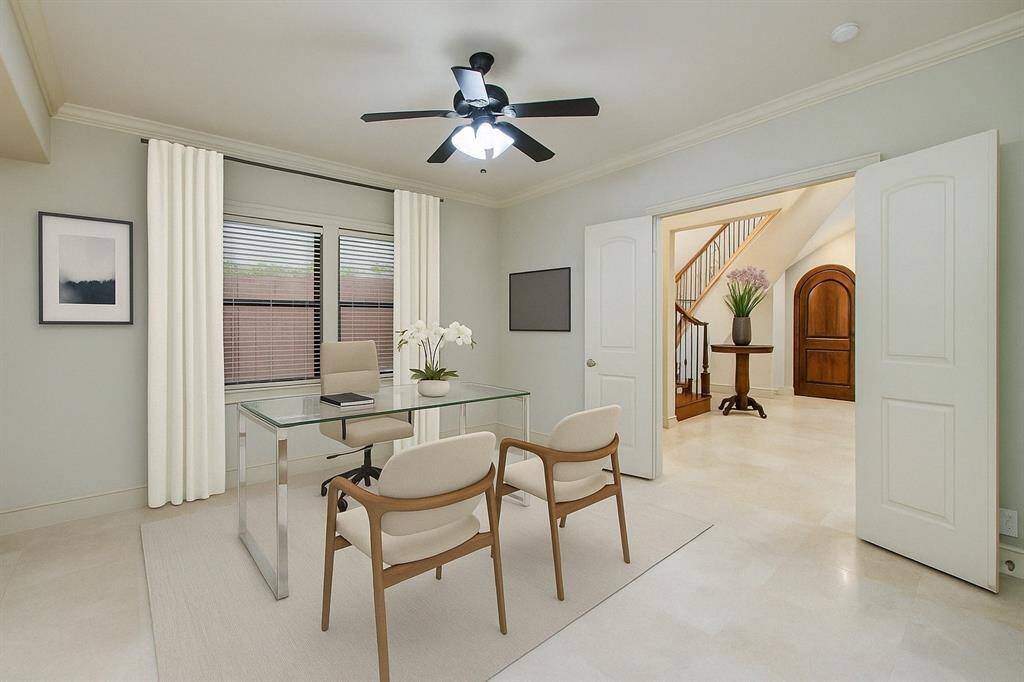 Virtually staged, the first floor bedroom can be also a home office.