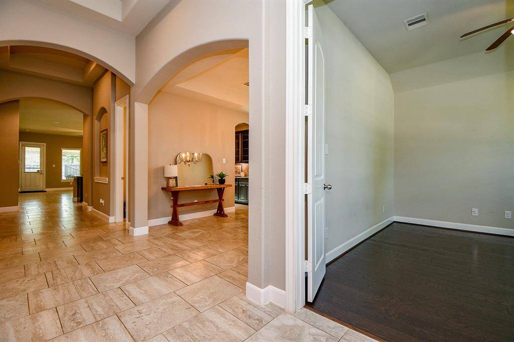 View of home office, dinning room and formal entry.