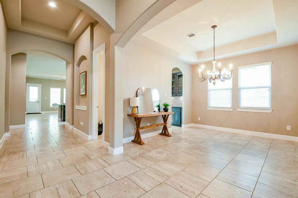 Great view of dinning room and foyer.