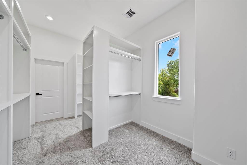 REPRESENTATIVE PHOTOS - NOT ACTUAL HOMENatural lighting in the primary closet.