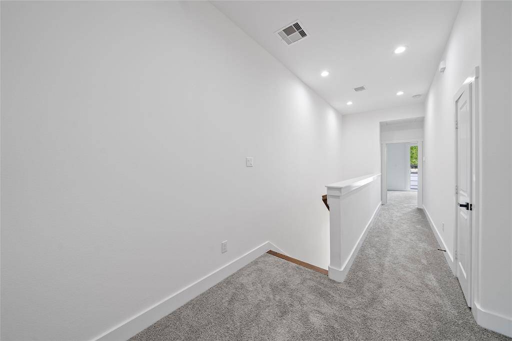 **Throughout 2nd floor, carpet will be replaced with luxury vinyl plank** Landing at the top of the staircase.