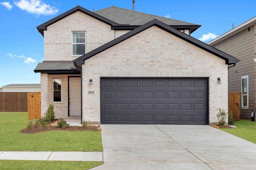 The front exudes curb appeal with its elegant architectural lines, complemented by a fresh, vibrant palette that catches the eye.