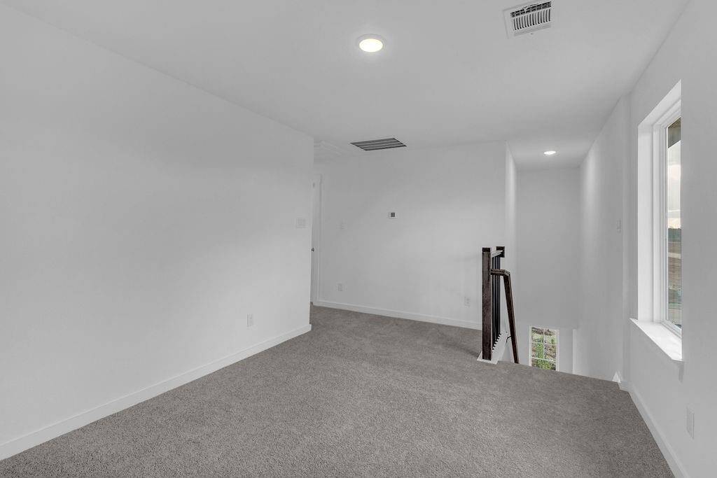 The versatility of this room means it can easily shift from a playroom for the kids to a serene yoga studio where you can unwind after a long day.