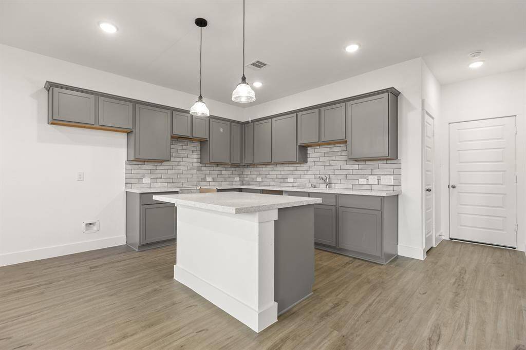 Whether you’re a seasoned chef or a novice just learning the ropes, this kitchen invites you to unleash your culinary creativity and savor every moment spent within its inviting walls. Microwave, Dishwasher, Stovetop range are included, just not pictured.