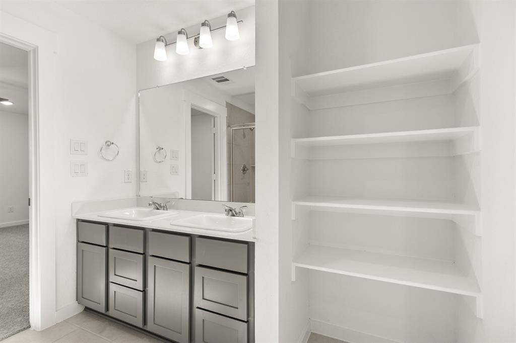 With thoughtful storage solutions tucked away, everything you need is at your fingertips, while maintaining a clean, uncluttered look.