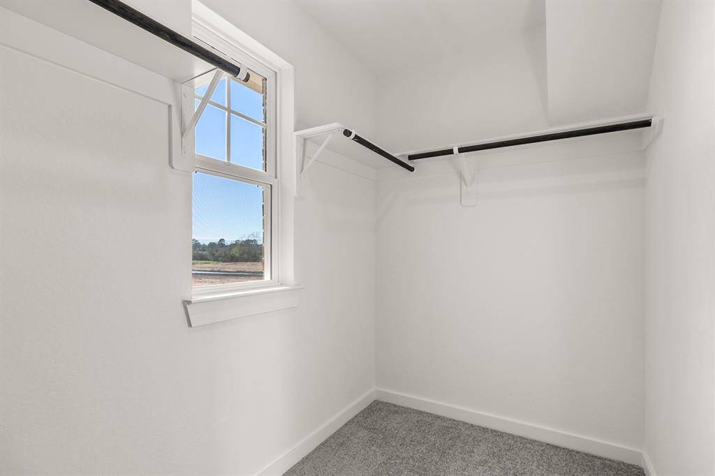 This closet is where your personal style flourishes, and every day starts with a little extra inspiration. Welcome to a space that feels not just like storage, but like a true extension of who you are.
