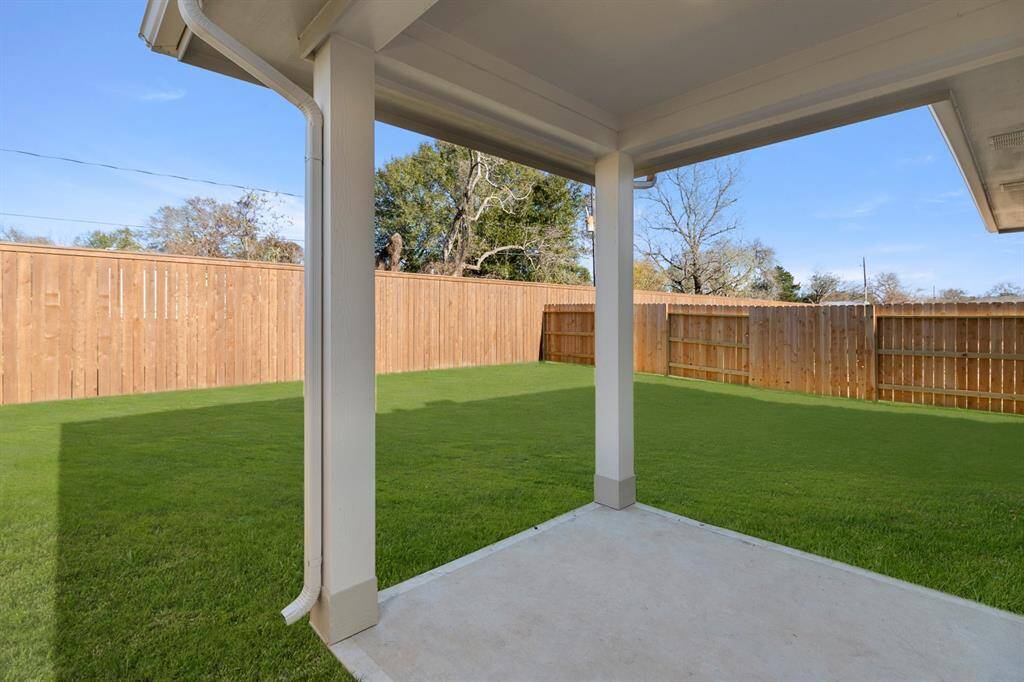 Picture a spacious patio, perfect for summer barbecues and lazy Sunday brunches with friends.