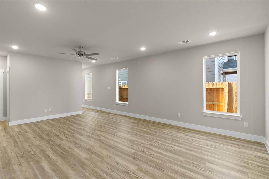 As you wander through the open floor plan, you’ll notice high ceilings that elevate the ambiance, while carefully chosen materials add a touch of luxury without losing that cozy feel.