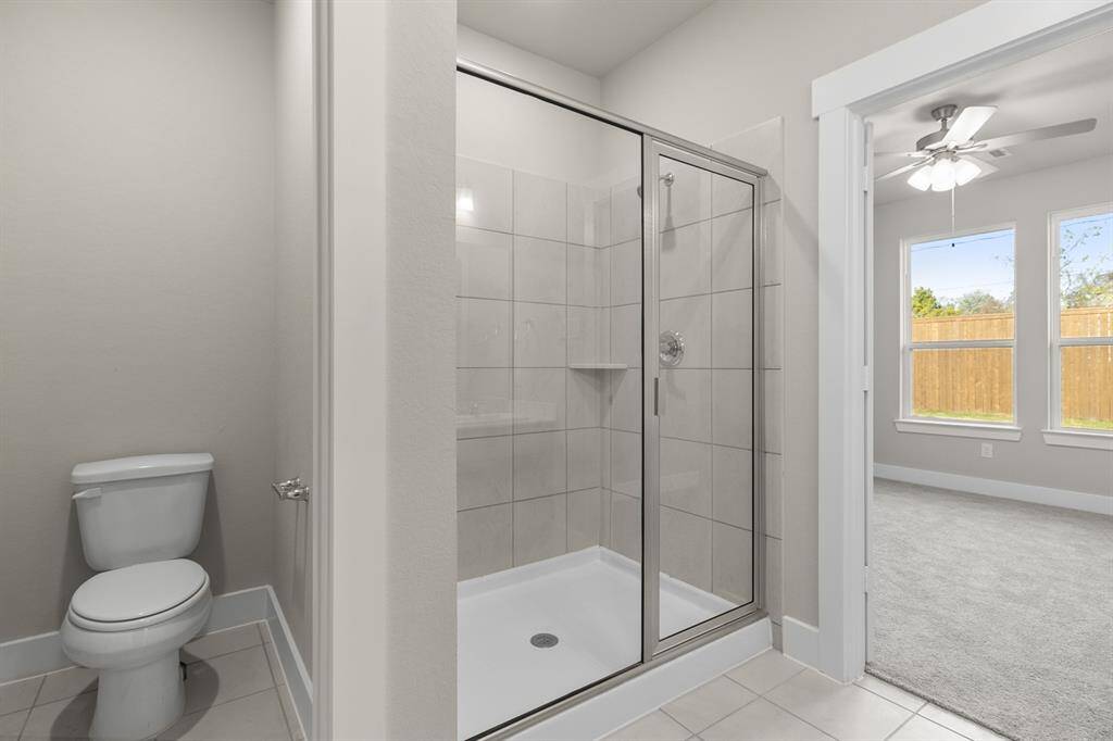 Melt your worries away in this oversized walk in shower.