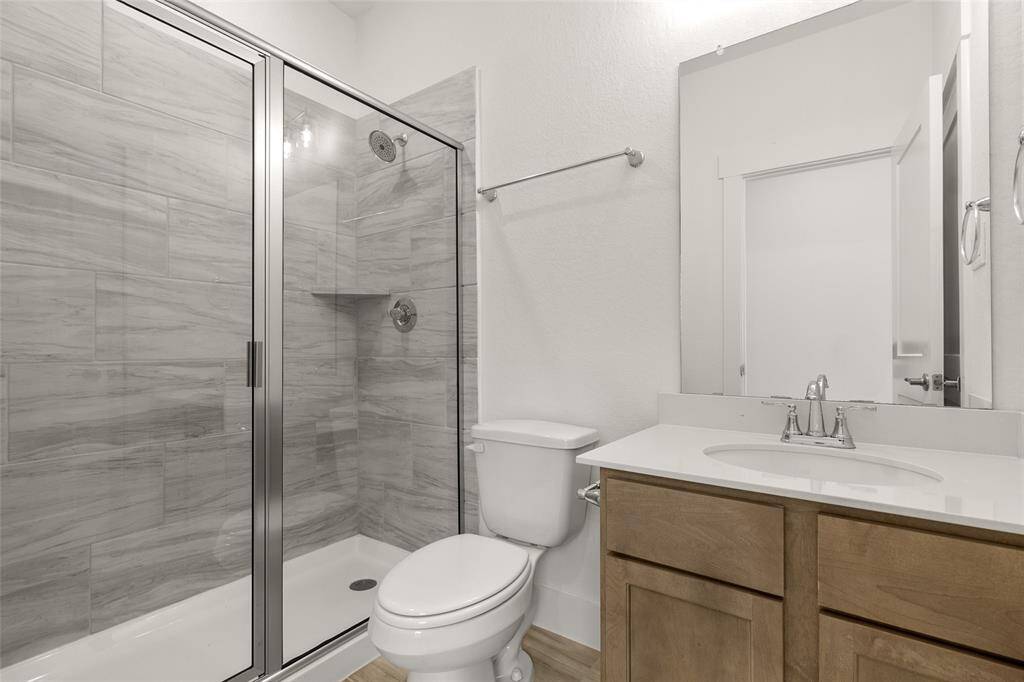 Secondary ensuite bath, perfect for any guest or teenager who needs their own tranquil space to unwind.