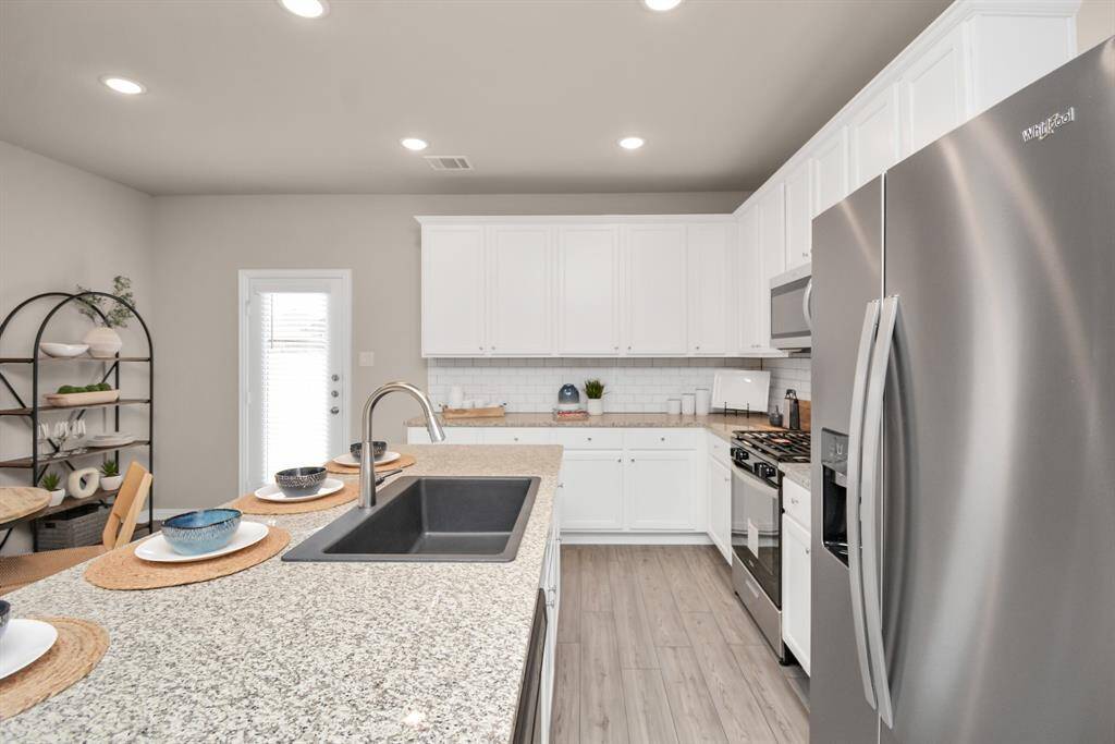 *Photos are of the Model Home, the Trinity Floor Plan*All finishes/color schemes are similar*Elevation may or may not be of exact home, please verify elevation for each home.