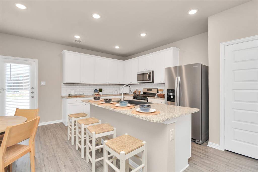 *Photos are of the Model Home, the Trinity Floor Plan*All finishes/color schemes are similar*Elevation may or may not be of exact home, please verify elevation for each home.