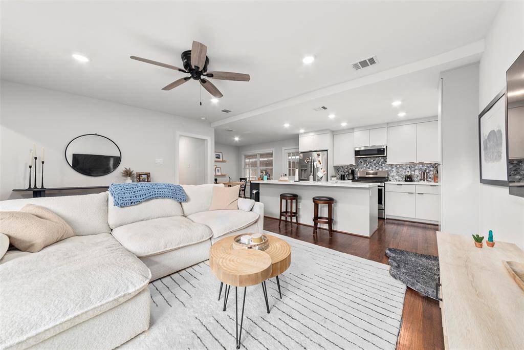 Hardwood floors, modern finishes, and open floor plan