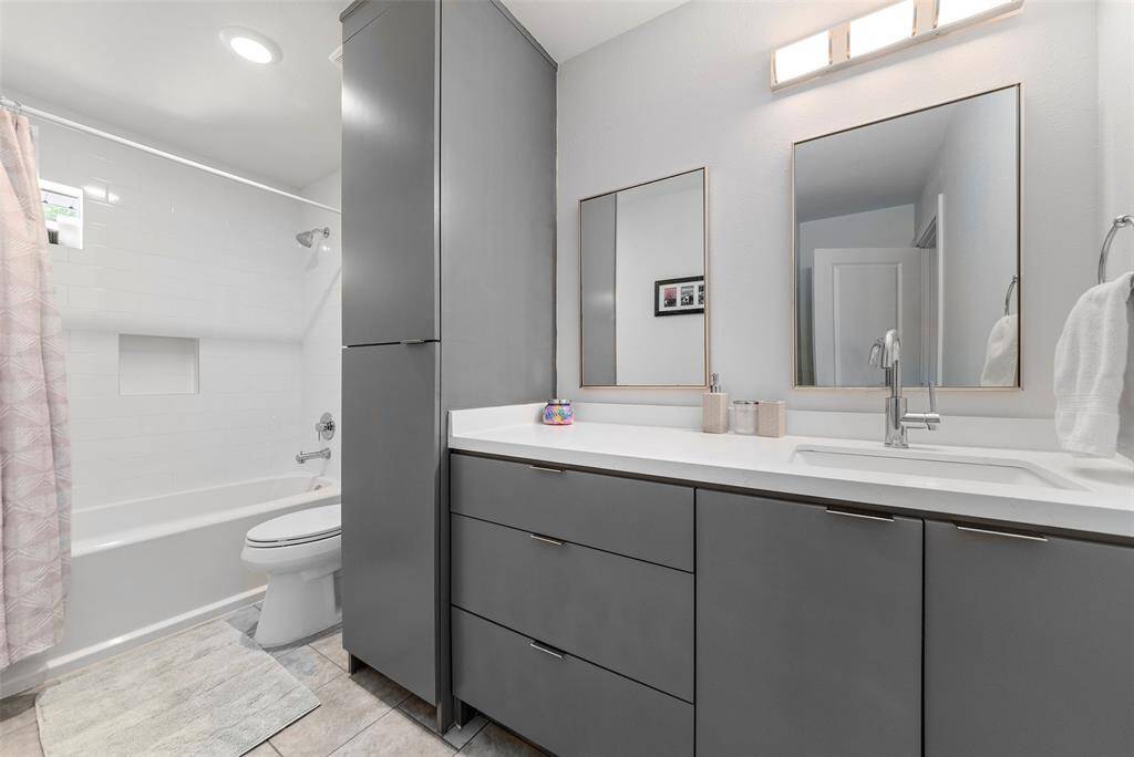 Well appointed secondary bathroom with tons of storage