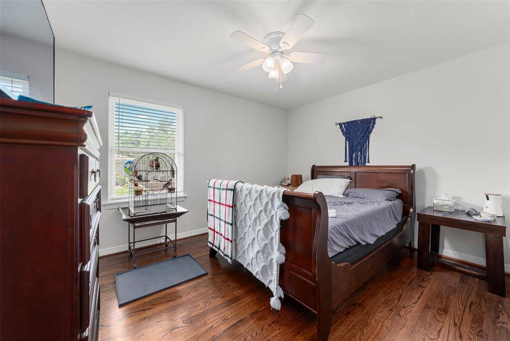 The first of the two secondary bedrooms large enough for oversized furniture and then some!