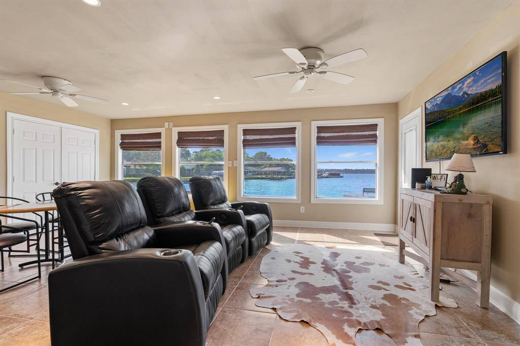 This space was also added to create the casual great room and has a door to the lake!