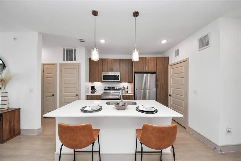 Photos displayed may be of similar apartments or floor plans featuring the same finishes.