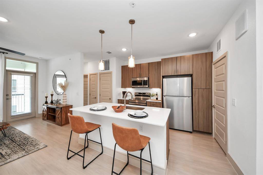 Photos displayed may be of similar apartments or floor plans featuring the same finishes.