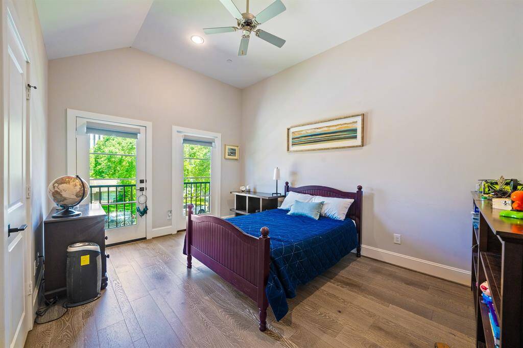 Secondary bedroom with shower/tub combination.