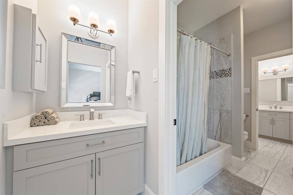 One of two full bathrooms upstairs