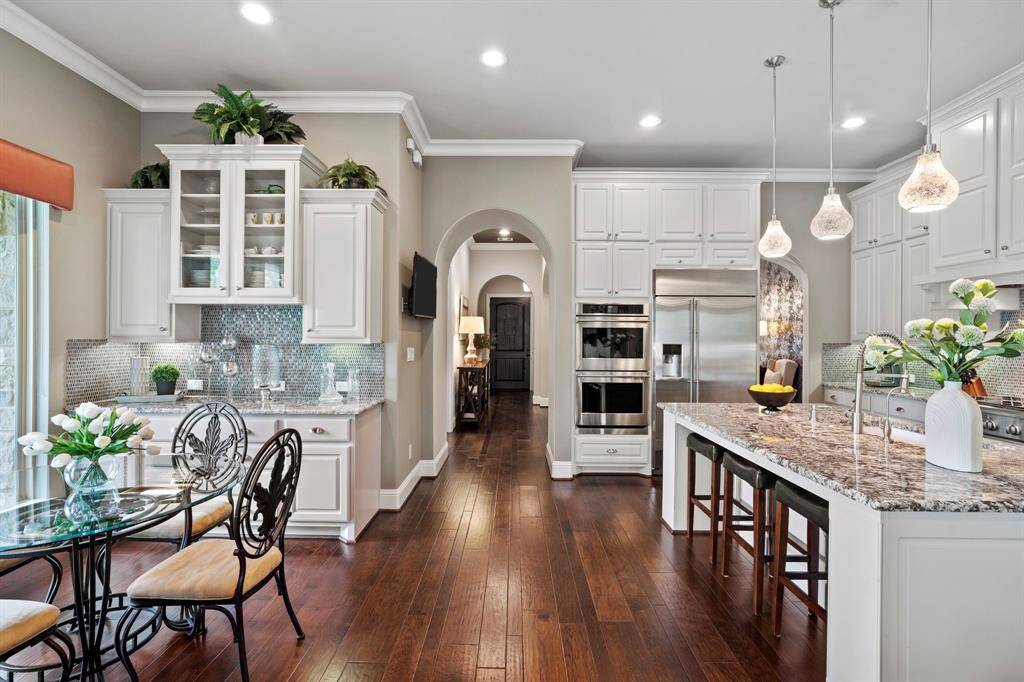 Hardwood floors throughout common area