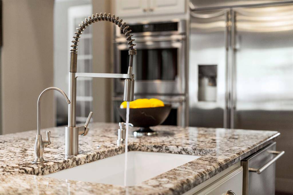Pull down faucet with single basin sink