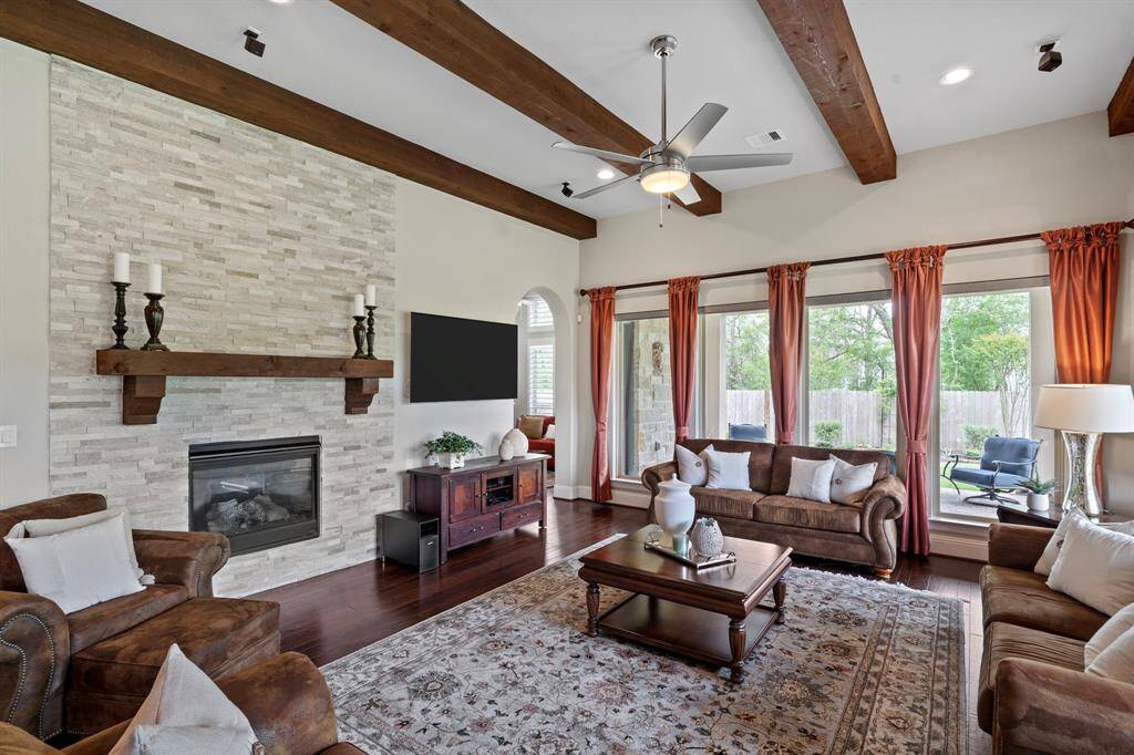 Family room easily accommodates oversized furniture