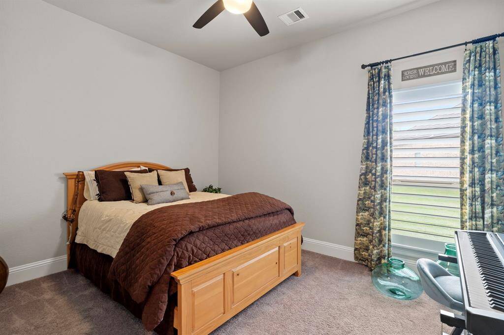 Additional secondary bedroom - all curtain rods and panels convey