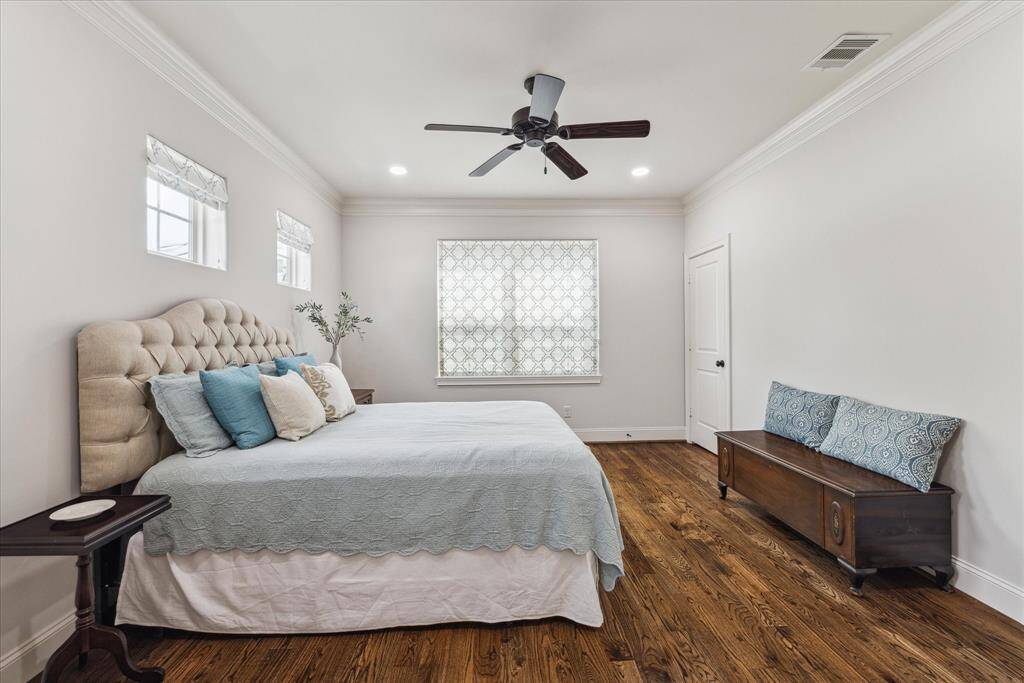 Large secondary bedroom on second floor features an en-suit bath and walk-in closet.