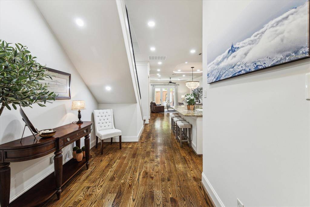 Entry has a space underneath staircase is great for piano or sitting area.