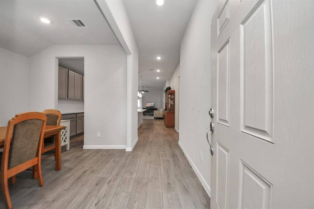 Step into this home with high ceilings and recessed lighting.