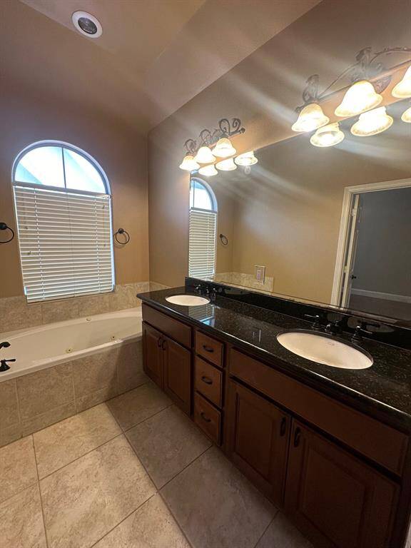 Granite counters and dual sinks in primary bath